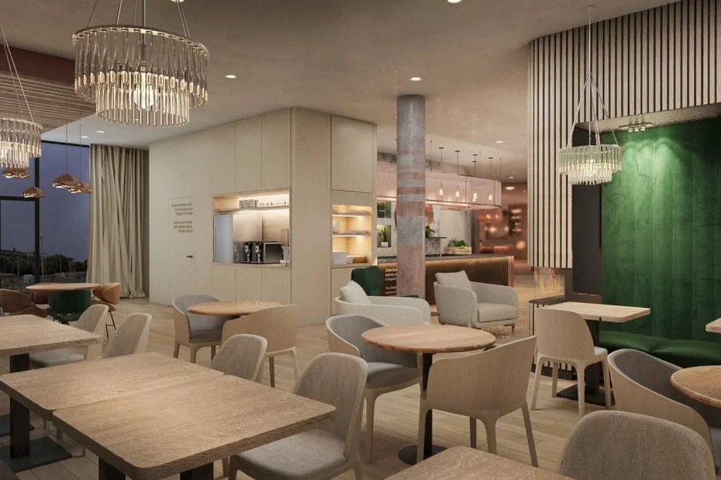 Modern breakfast and lounge area with contemporary seating at B&B Hotel Lublin Centrum in Lublin, Poland.
