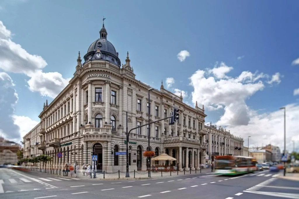 Historic facade with classic architectural details and a prominent entrance in the city center at IBB Grand Hotel Lublin
